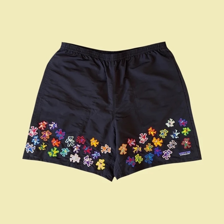 Black shorts with rainbow colored dancing bears embroidery